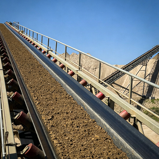 Industrial belt conveyor operation site