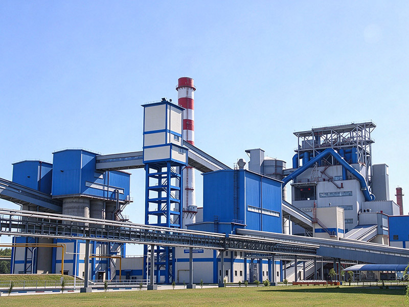 Heavy duty troughed belt conveyor for clinker and raw material transport in cement plant